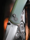 North Mountain Blade Ultra Mini 2628-JD jade G10 handle and button lock detail
