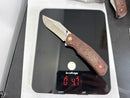 North Mountain Blade Jellyfish 4th Generation 3.5in M390 Blade Titanium Frame Ceramic Carbon Fiber Handle Red Orange
