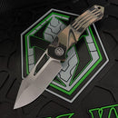 Heretic Pariah Manual 3.77" Drop Point Battleworn CPM-Magnacut Tri-Camo G-10 Handles