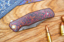 North Mountain Blade Jellyfish 4th Generation 3.5in M390 Blade Titanium Frame Ceramic Carbon Fiber Handle Red Orange