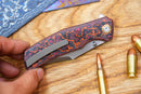 North Mountain Blade Jellyfish 4th Generation 3.5in M390 Blade Titanium Frame Ceramic Carbon Fiber Handle Red Orange