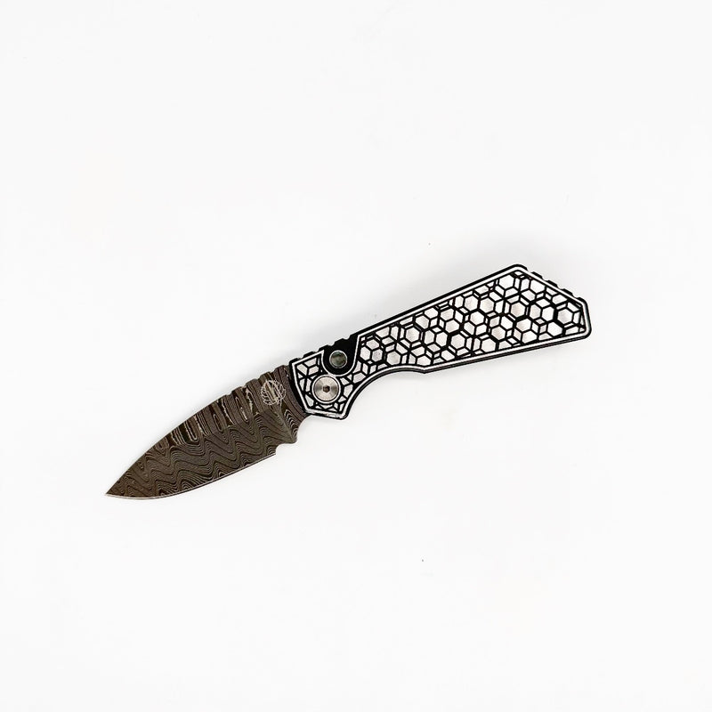Pro-Tech 2024 Strider PT+ Custom 001 3in Chad Nichols Damascus Blade Two Toned 17-4 Stainless Steel Gridlock Pattern Handles