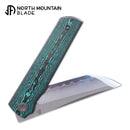 North Mountain Blade CHOP 4 2412-GRCF – SLD San Mai Japanese-Style Tanto, Ceramic Carbon Fiber, Front Flipper