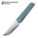 North Mountain Blade CHOP 4 2412-GRCF – SLD San Mai Japanese-Style Tanto, Ceramic Carbon Fiber, Front Flipper
