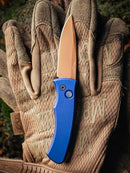 Pro-Tech Duke 2 Dark Navy Blue Aluminum Handle Tan PVD Magnacut Blade Black Lip Pearl Button