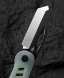 Bestech EXPLORER BG37C handle detail – transparent G10 scales revealing liner lock mechanism