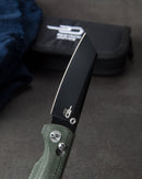 Bestech SLASHER BG43B-2 handle detail – green Micarta texture and natural fiber layering