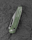 Bestech Cobber BG68D handle detail – green Micarta scales texture
