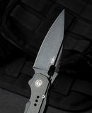 Bestech Exploit BT2005C handle detail – black stonewash titanium frame lock, 143g, Toddknifeandtool design