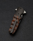 Bestech Freefall BT2007B side view – black titanium frame with orange G10 scales