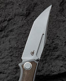 Bestech Togatta BT2102D handle detail – dark grey titanium frame lock, 139g, Koenscraft design