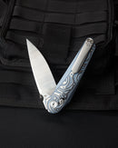 Bestech Mothus BT2206A side view – blue anodized titanium handle showing bar lock and ceramic bearings