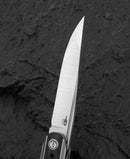 Bestech Spear Phisher BT2405B handle detail – white bead blast titanium with marble carbon fiber inlay