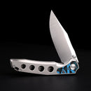 FerraMonster Valken FM23005-B – 3.46" M390 Belt Satin Clip Point Blade, Titanium Frame Lock with Arctic Storm FatCarbon Inlay