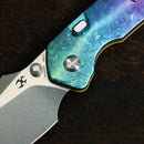 Kansept Fenrir K1034H2 open position showing CPM 20CV Harpoon blade