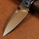 Kansept Falk K1142A3 blade detail – Rose Gold Elmax Drop Point