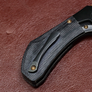 Kansept Pluto K3129A4 closed view showing hidden lanyard hole