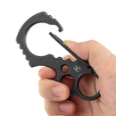 Hand holding Kansept Carabiner C011A1 blackwash titanium with keyring clip for outdoor use