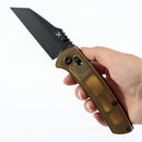 Kansept Main Street K1015V4 – 3.36" CPM S35VN Wharncliffe Amber PEI Crossbar Lock Knife