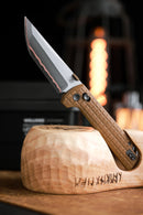 North Mountain Blade 2418-TAN-G-5 blade detail - 3.5-inch 5-layer copper-clad steel with visible copper core line