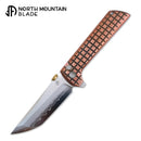 North Mountain Blade Chop 2 – SLD-Magic Copper Grid Handle Knife | .45 Thumb Disc & Button Lock (2406CU)
