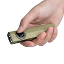Olight ArkPro Ultra held in hand showing its flat EDC profile and thumb-reach selector
