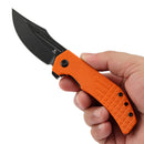 Orange G10 handle with black blade and hand