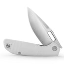 Hand holding folding lock knife with satin blade and textured handle