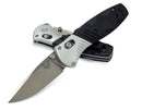 Benchmade Mini Barrage 586 showing M390 drop point blade and black G10 handle