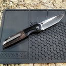 Kansept Warrior Exclusive CPM-S35VN Steel Black Anodized Titanium w/ Black and Red Copper Carbon Fiber Handles